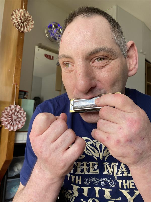 Dalby View - Alan enjoying the harmonica.