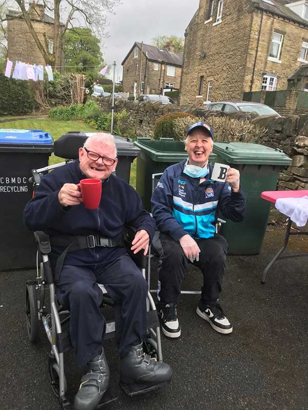Alex and Brendon enjoy a well-deserved cup of tea after completing their 2.6 Challenge