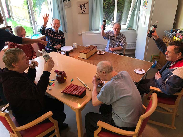 Enjoying a slice of cake after a good music and sing-along session!