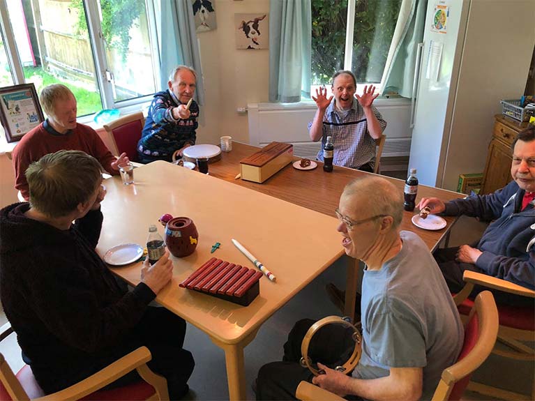 Enjoying a slice of cake after a good music and sing-along session!