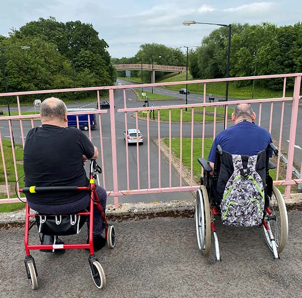 Enjoying a walk and some traffic watching.
