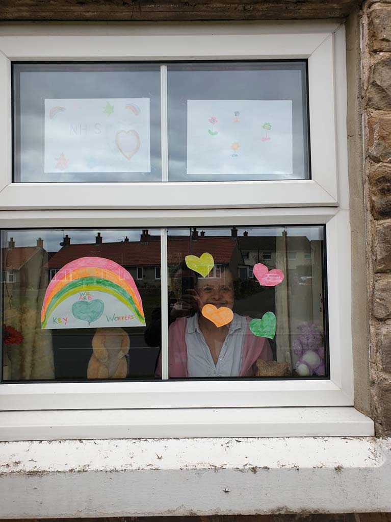 The ladies in house 5 are keeping passers-by smiling